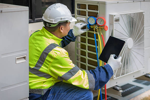 Professional Air Conditioning Repair technician working in Bynum, NC